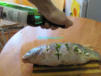 Запечённый карп, фаршированный гречневой кашей
Запечённый карп, фаршированный гречневой кашей